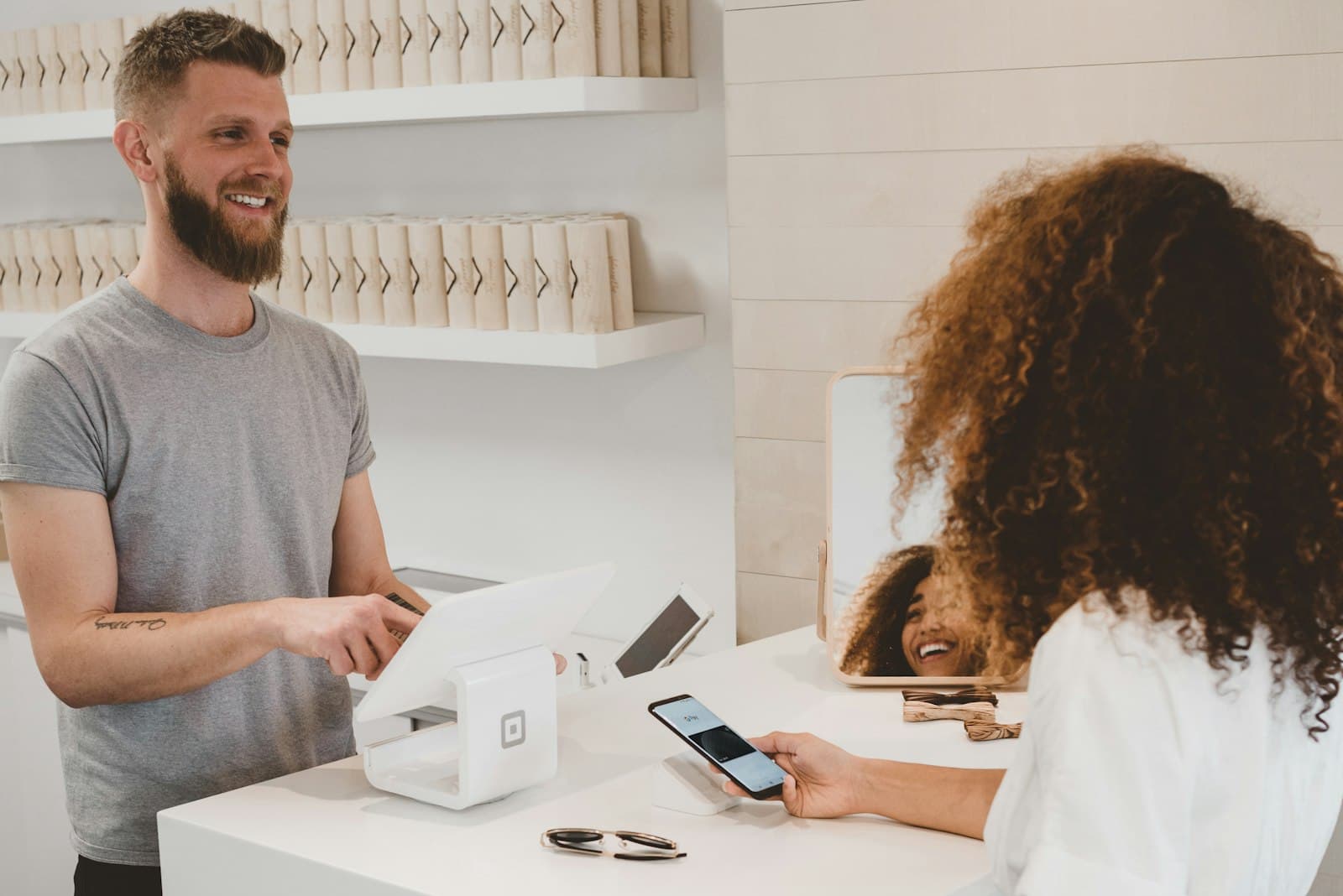 A couple managing their finances together on a phone